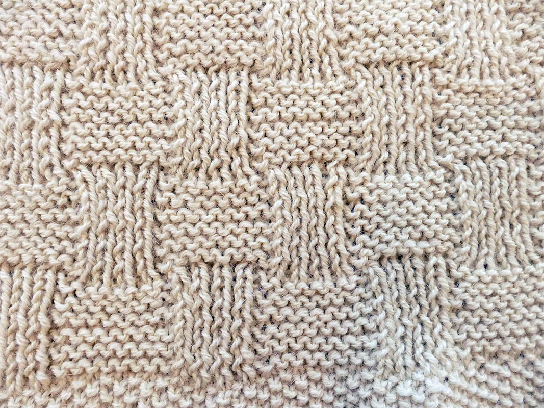 Teviotdale Arans - Baby blanket knitted biege